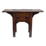 An Oak bedside table   19th century with drawer and lift up extension sections 67cm.; 26½ins high by