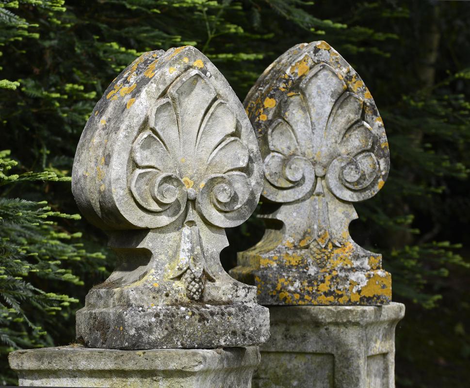 A pair of carved limestone finials  French, mid 19th century 58cm.; 23ins high