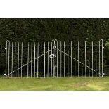A pair of wrought iron estate gates  2nd half 19th century 131cm.; 52ins high by 328cm.; 129ins