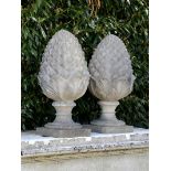A pair of large composition stone gatepier pineapples late 20th century  91cm.; 36ins high