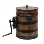 An Original Miele Oak and cast Iron Washing Machine   with cog mechanism 52cm.; 20½ins high by