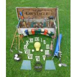 An Edwardian game of Golfstacle  English, circa 1910 comprising a range of tinplate obstacles