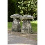 Two substantial carved limestone staddlestones  the larger 86cm.; 35ins high