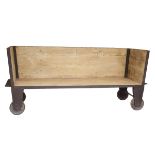 A Mining Sofa  Salvaged mining trolley and cedar wood 90cm.; 35½ins high by 210cm.; 82½ins wide by