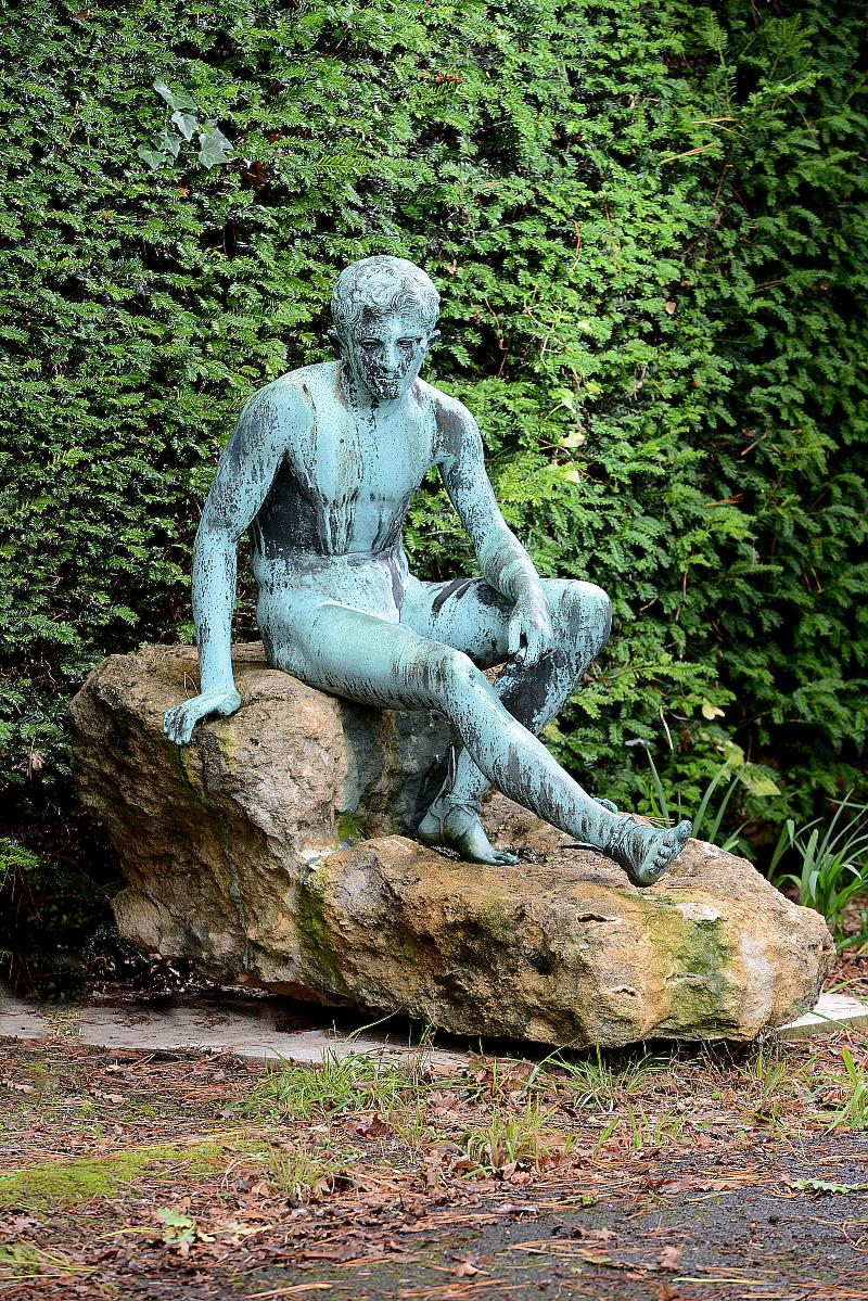 Garden Statue: After the Antique: A bronze figure of a seated MercuryItalian, circa 1900on carved