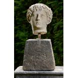Garden Statue: A carved white marble head17th century or earlier29cm.; 11½ins