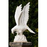 A pair of cast iron eagles  2nd half 20th century 117cm.; 46ins high by 76cm.; 30ins wide