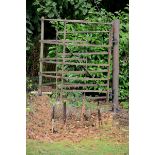 A wrought iron kissing gate  2nd half 19th century with later hanging post 103cm.; 40½ins diameter