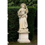 Garden Statuary: A carved limestone figure in 18th century dress on pedestal   Italian,  last