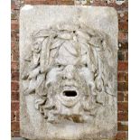 A carved stone fountain mask   French,  19th century  mouth drilled for water 99cm.; 39ins high by