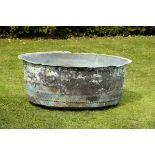 Garden Urn: A washing copper  19th century 49cm.; 19ins high by 114cm.; 45ins diameter