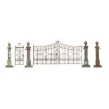 A Victorian cast iron entranceway  circa 1870 comprising a pair of gates each gate 216cm.; 85ins