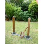 A pair of vintage wooden grass court tennis posts by Spalding,  London  circa 1930 brass winder