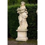 Garden Statuary: A carved limestone figure in 18th century dress on pedestal   Italian,  last