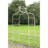 A wrought iron rose arch   modern 269cm.; 106ins high by 158cm.; 62ins wide