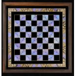 Natural History: A Butterfly wing chessboard  in mahogany frame 42cm.; 16½ins square