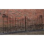 A pair of Edwardian wrought iron gates   early 20th century  145cm.; 57ins high by 365cm.; 144ins