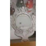 Porcelain cherub mirror