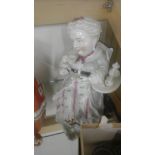 Lady drinking tea ornament