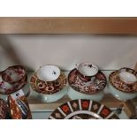 4 Crown Derby cups and saucers
