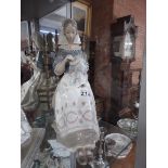 Lladro lady sewing