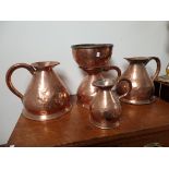 4 Copper jugs and funnel