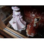 2 porcelain figures