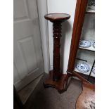 Ornate wooden plant stand