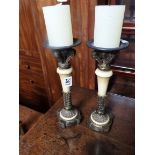 Pair of ornate candle sticks