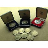 THREE SILVER PROOF COIN SETS 1981, 1981 and 1977, together with a bag containing seven 1960's