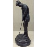 A 20TH CENTURY FRENCH BRONZE FIGURE Of an Edwardian golfer wearing plus fours, supported on a marble
