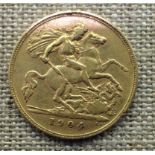 A GOLD HALF SOVEREIGN COIN Edward VII portrait and George & Dragon to reverse, dated 1904.