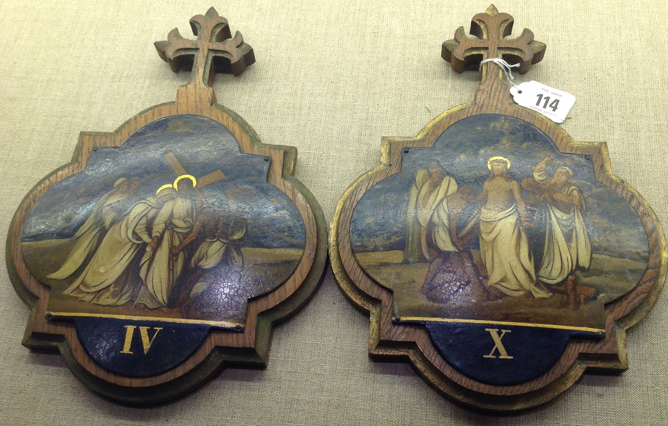 TWO 19TH CENTURY STATIONS OF THE CROSS Enamelled on tin and mounted on oak frames with crucifix