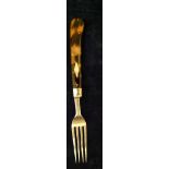 A 19TH CENTURY SOLID SILVER FORK Having a tortoiseshell handle with an inlaid silver lozenge,