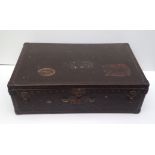 LOUIS VUITTON A vintage leather bound suitcase, complete with inner tray (no: 796835). (70½cm x 43½