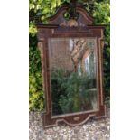 A 19TH CENTURY FAUX WALNUT MIRROR OF GEORGE I DESIGN Applied with gilt shell and egg and dark