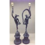 A PAIR OF LATE 19TH CENTURY BRONZE FIGURAL TABLE LAMPS Mercury and Venus, on marble bases