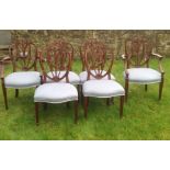 A SET OF SIX 20TH CENTURY REGENCY STYLE CHAIRS The heart shaped backs with Prince of Wales