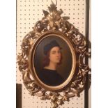 TWO 19TH CENTURY ITALIAN SCHOOL OVAL PORTRAITS ON PANEL Contained in gilt wood Florentine frames. (