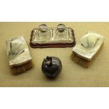 A HALL MARKED SILVER DESK STANDISH Two silver backed brushes and a silver 900 pomegranate.
