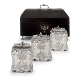 A SET OF THREE GEORGE III SILVER TEA CADDIES Mark of John Romer, London, 1766, each oblong, the