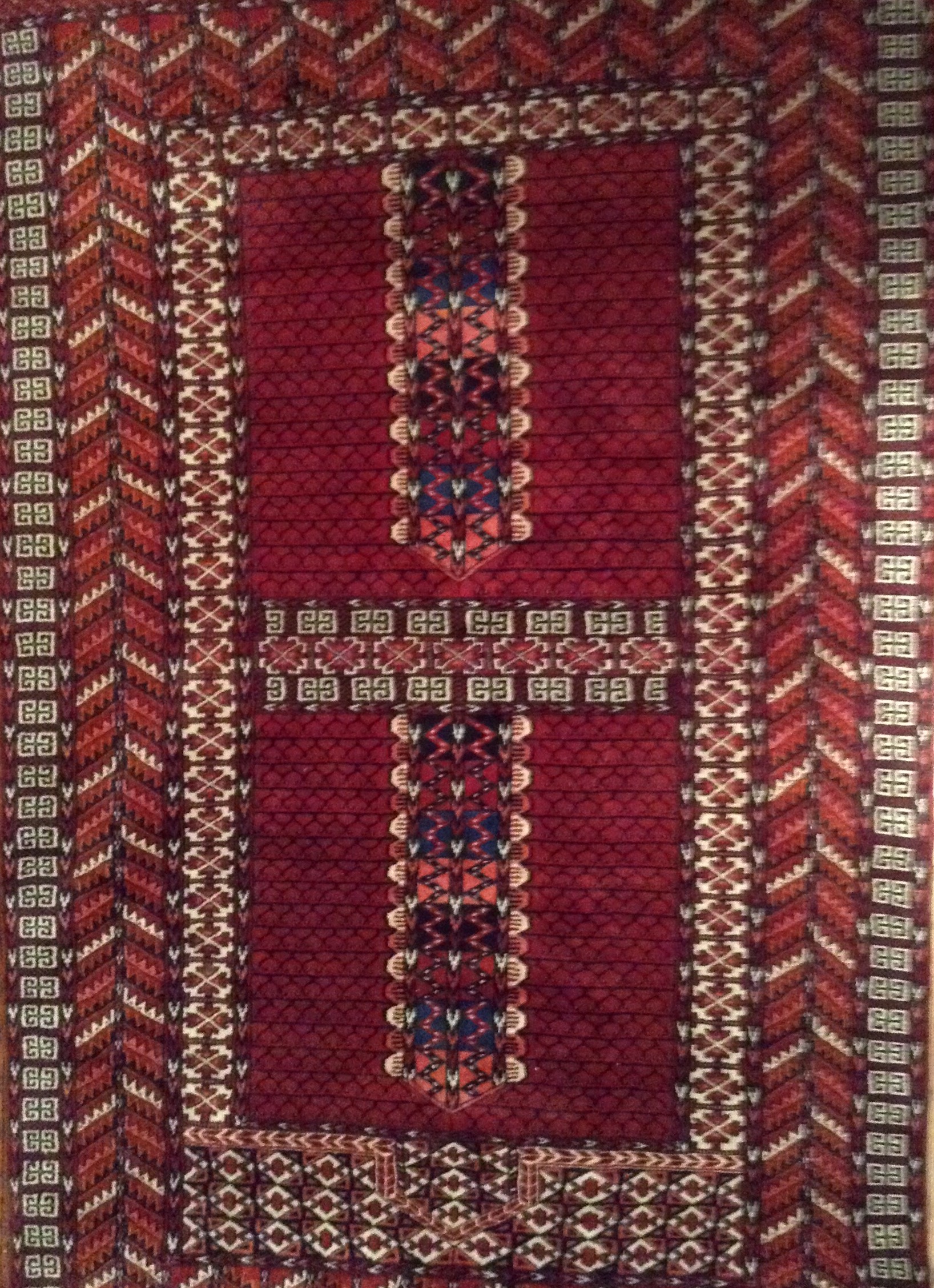 A BALUCH HATCHLI STYLE RUG Having a wide border to centre. (approx 122cm x 212cm)