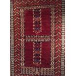 A BALUCH HATCHLI STYLE RUG Having a wide border to centre. (approx 122cm x 212cm)