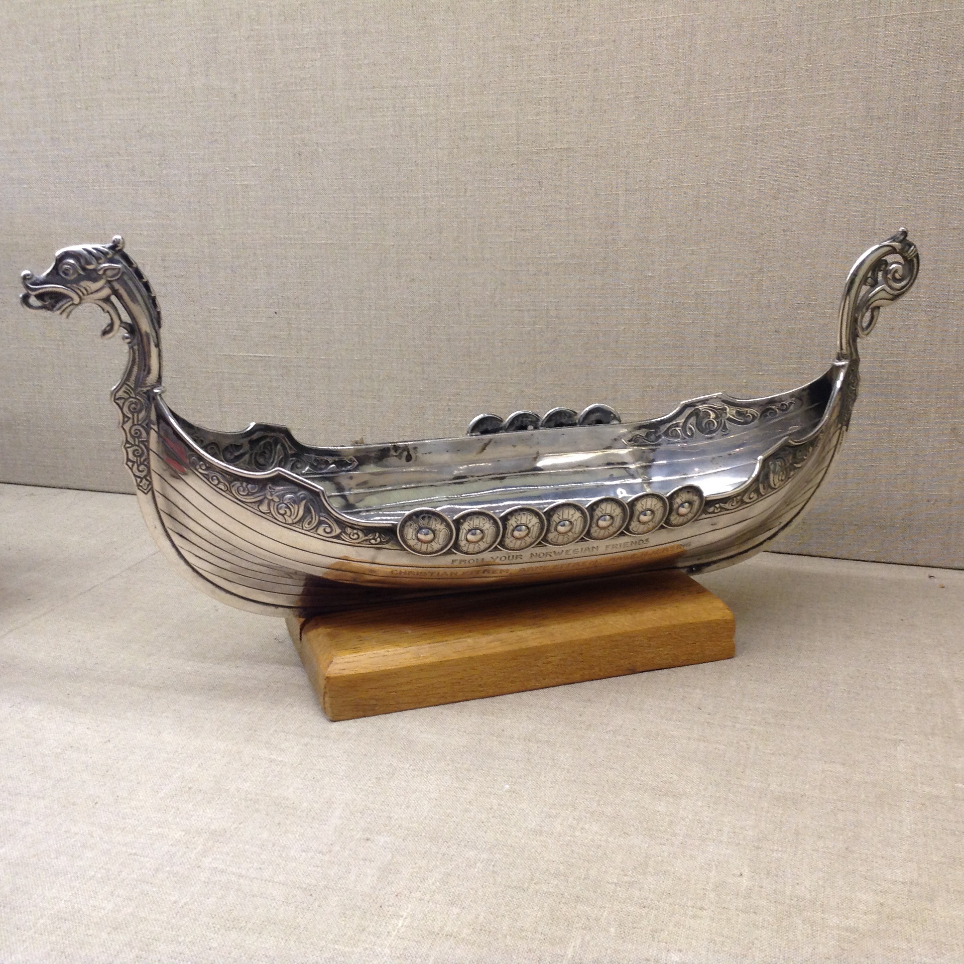 HAASE, A NORWEGIAN SILVER VIKING SHIP Decorated with embossed silver shields and having a dragon