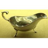JOSEPH RODGERS, SHEFFIELD, 1899 A hallmarked silver sauce boat, along with a trefoil pattern