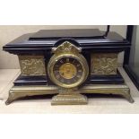 A LARGE 19TH CENTURY BRONZE AND BLACK BELGIAN MARBLE MANTLE CLOCK Decorated with Neoclassical