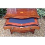A LATE 18TH CENTURY MAHOGANY SERPENTINE CHEST Of four graduating drawers, having Victorian inlays in
