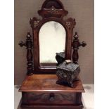 AN EARLY 20TH CENTURY STAINED PINE TOILET MIRROR With a single drawer, together with a Rococo