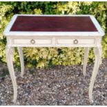 A 19TH CENTURY FRENCH CREAM PAINTED LADIES WRITING TABLE Applied with a maroon leather surface,