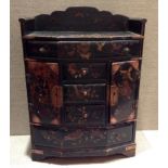 A 19TH CENTURY JAPANESE BLACK LACQUERED JEWELLERY BOX Having multi drawers and painted